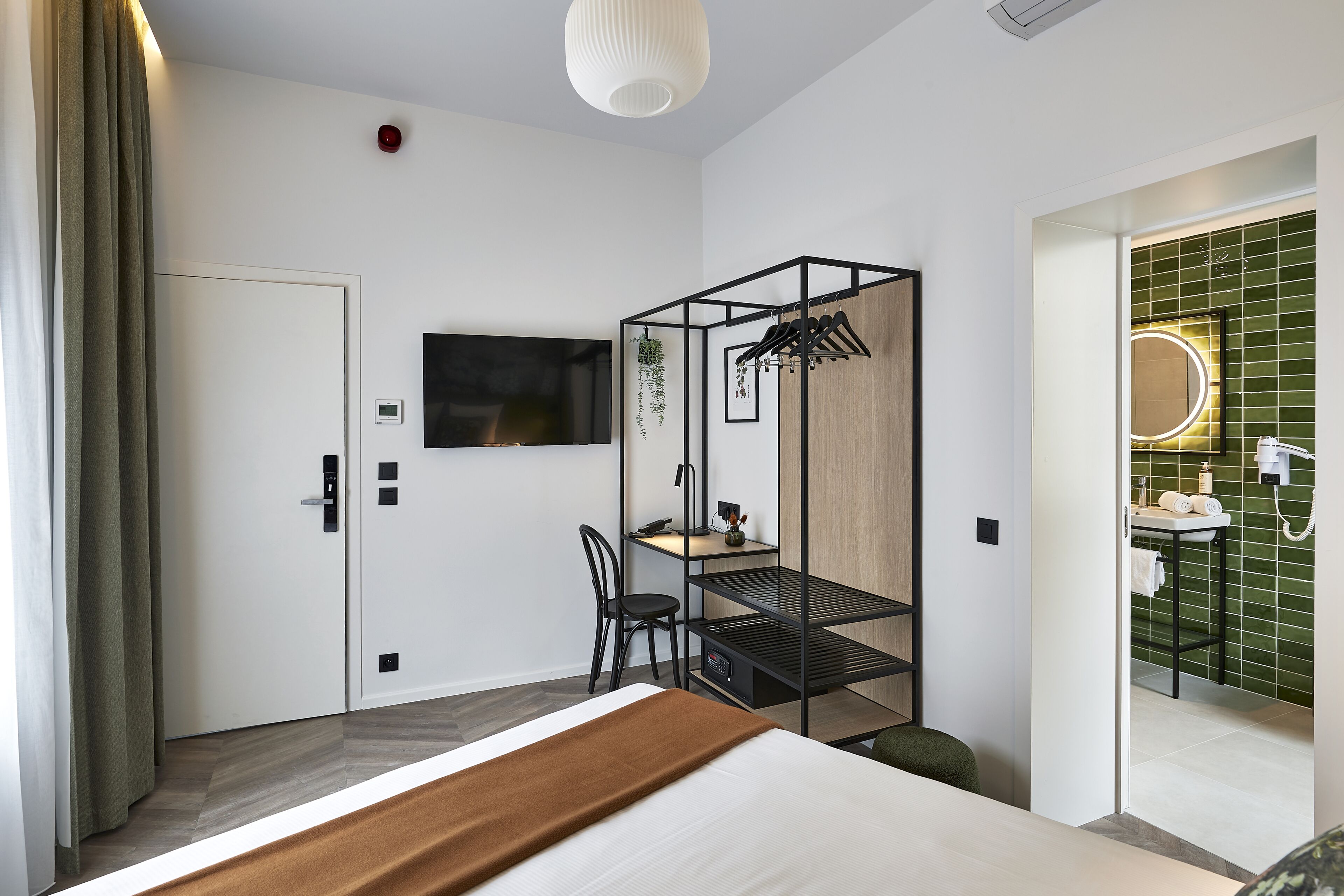 superior double room (florist) | in-room safe, individually decorated, blackout curtains