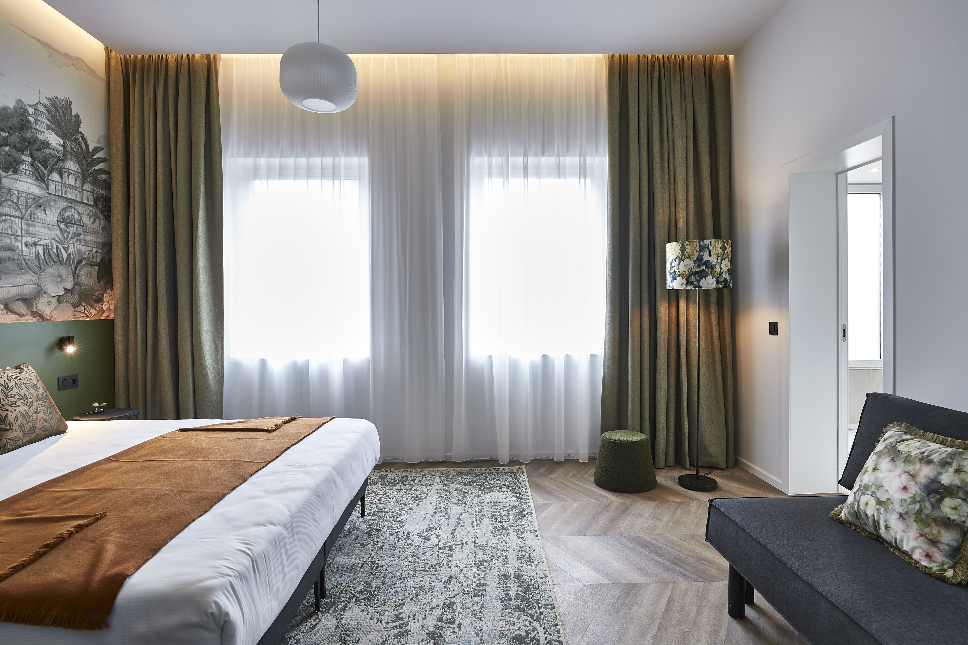 superior quadruple room (botanist) | in-room safe, individually decorated, blackout curtains