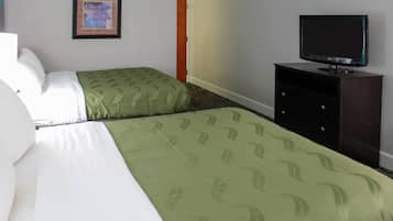 Premium bedding, desk, laptop workspace, blackout curtains