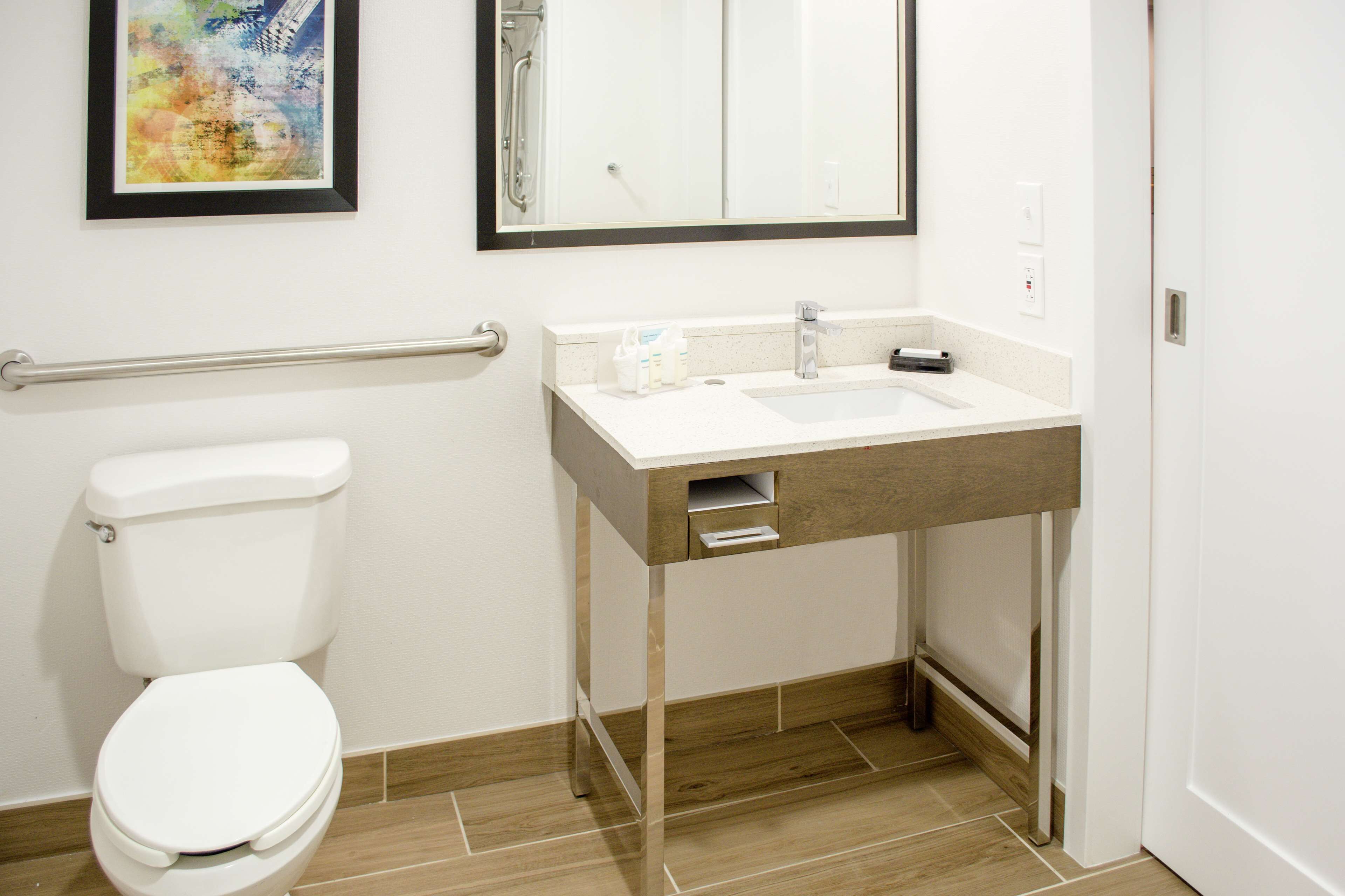 combined shower/bathtub, free toiletries, hair dryer, towels