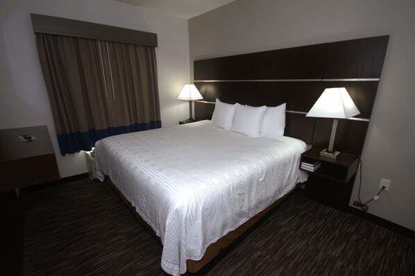 Down duvets, pillow-top beds, in-room safe, desk