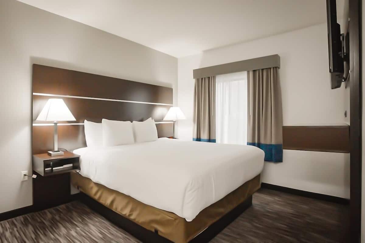 Down duvets, pillow-top beds, in-room safe, desk