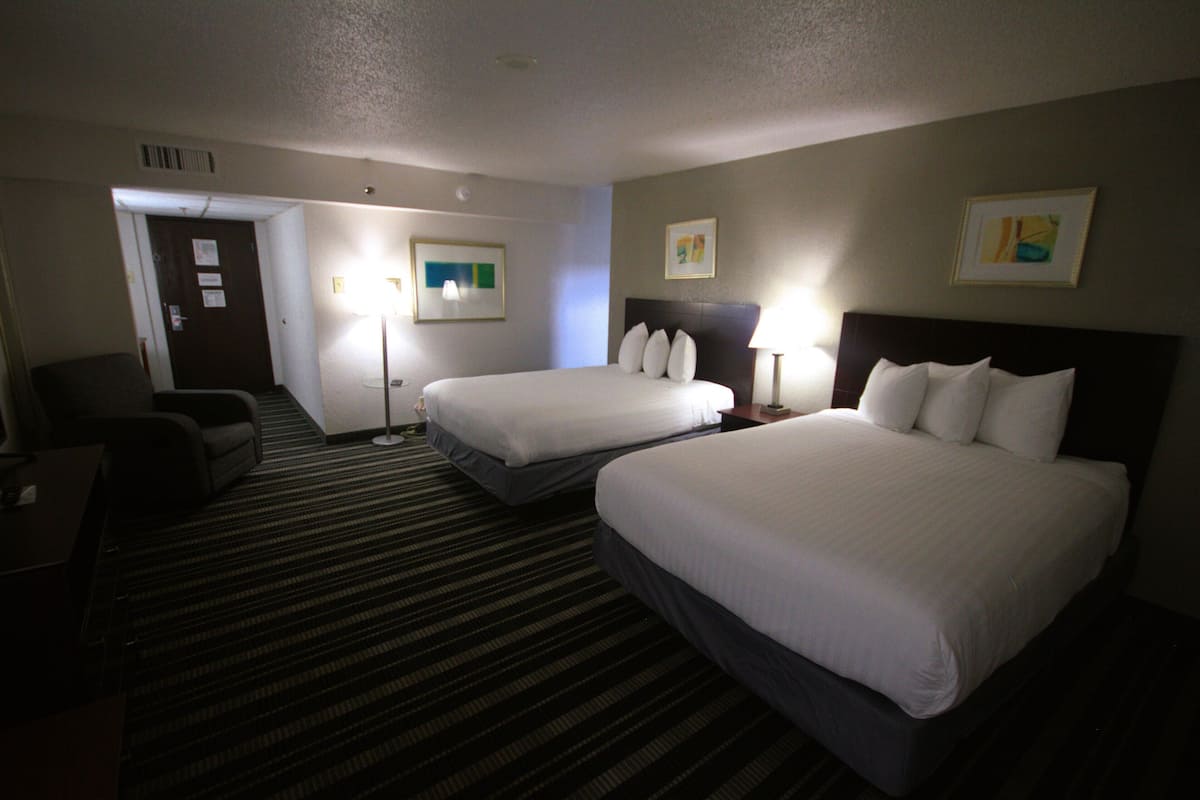 Standard Room, 2 Queen Beds, Non Smoking, Refrigerator & Microwave | 1 bedroom, down comforters, pillowtop beds, in-room safe