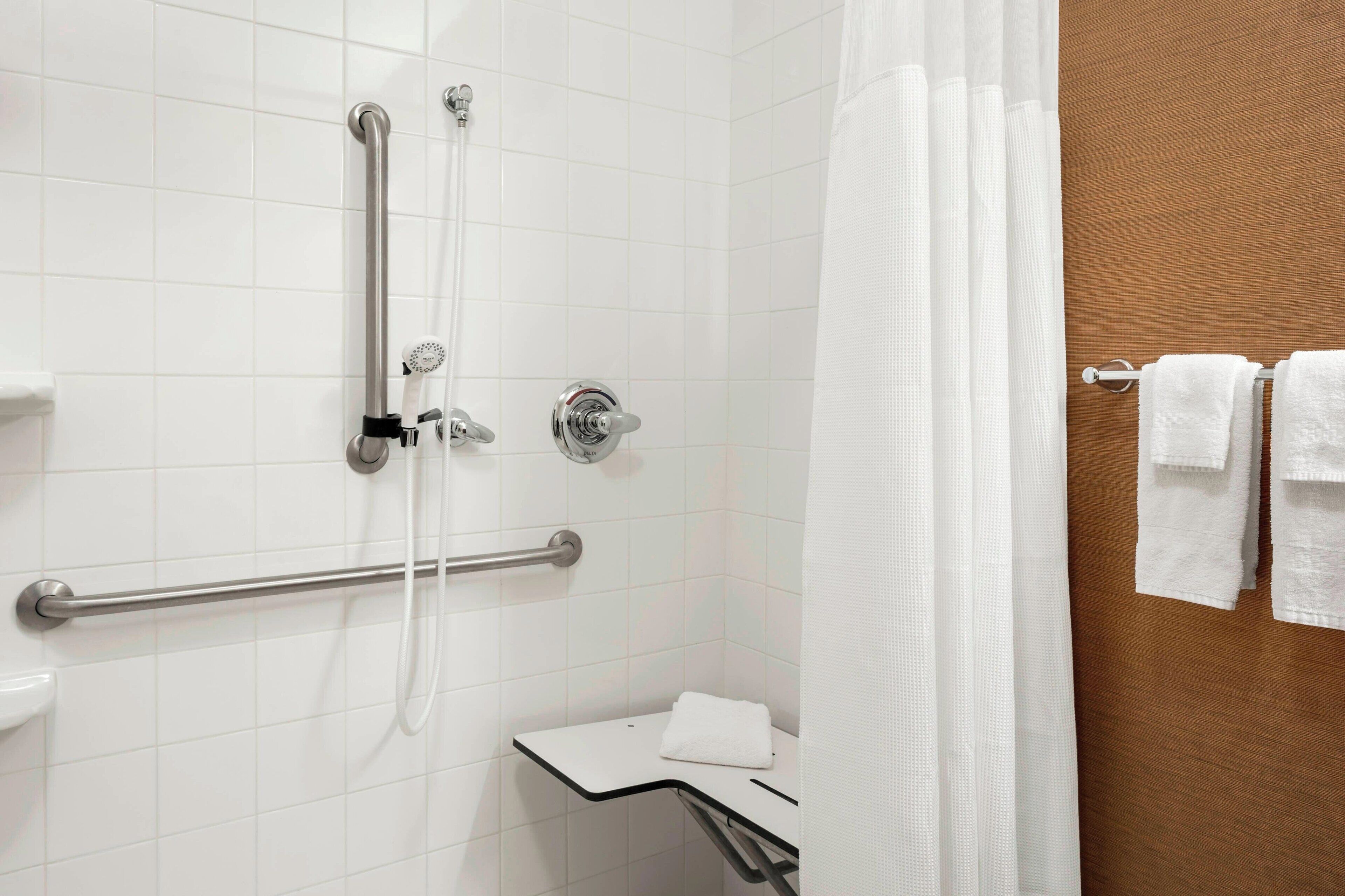 combined shower/bathtub, free toiletries, hair dryer, towels