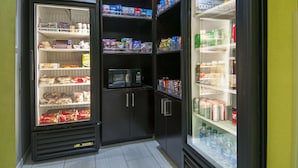 A frozen food vending machine with snacks and beverages. - Holiday Inn Express & Suites Jackson Downtown - Coliseum by IHG (Jackson)