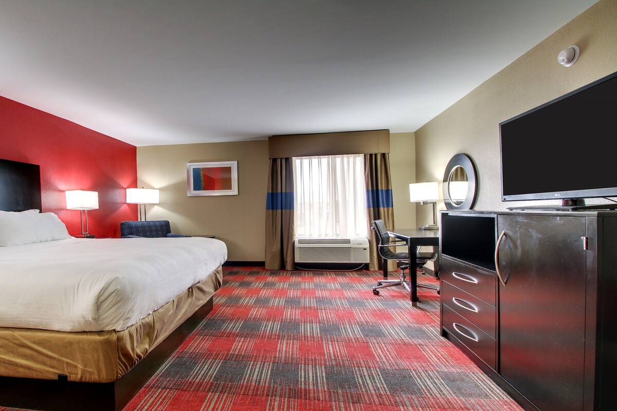 Premium bedding, pillow-top beds, desk, laptop workspace