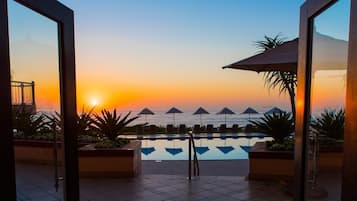 Outdoor pool, pool umbrellas, pool loungers