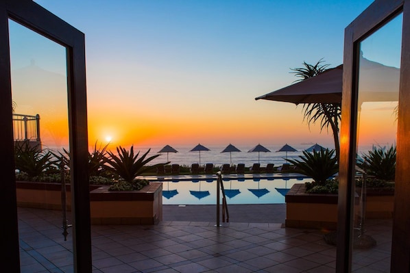Outdoor pool, pool umbrellas, pool loungers