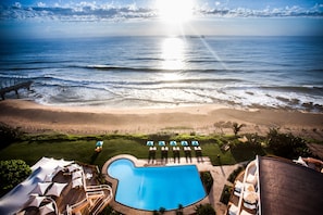 Outdoor pool, pool umbrellas, pool loungers