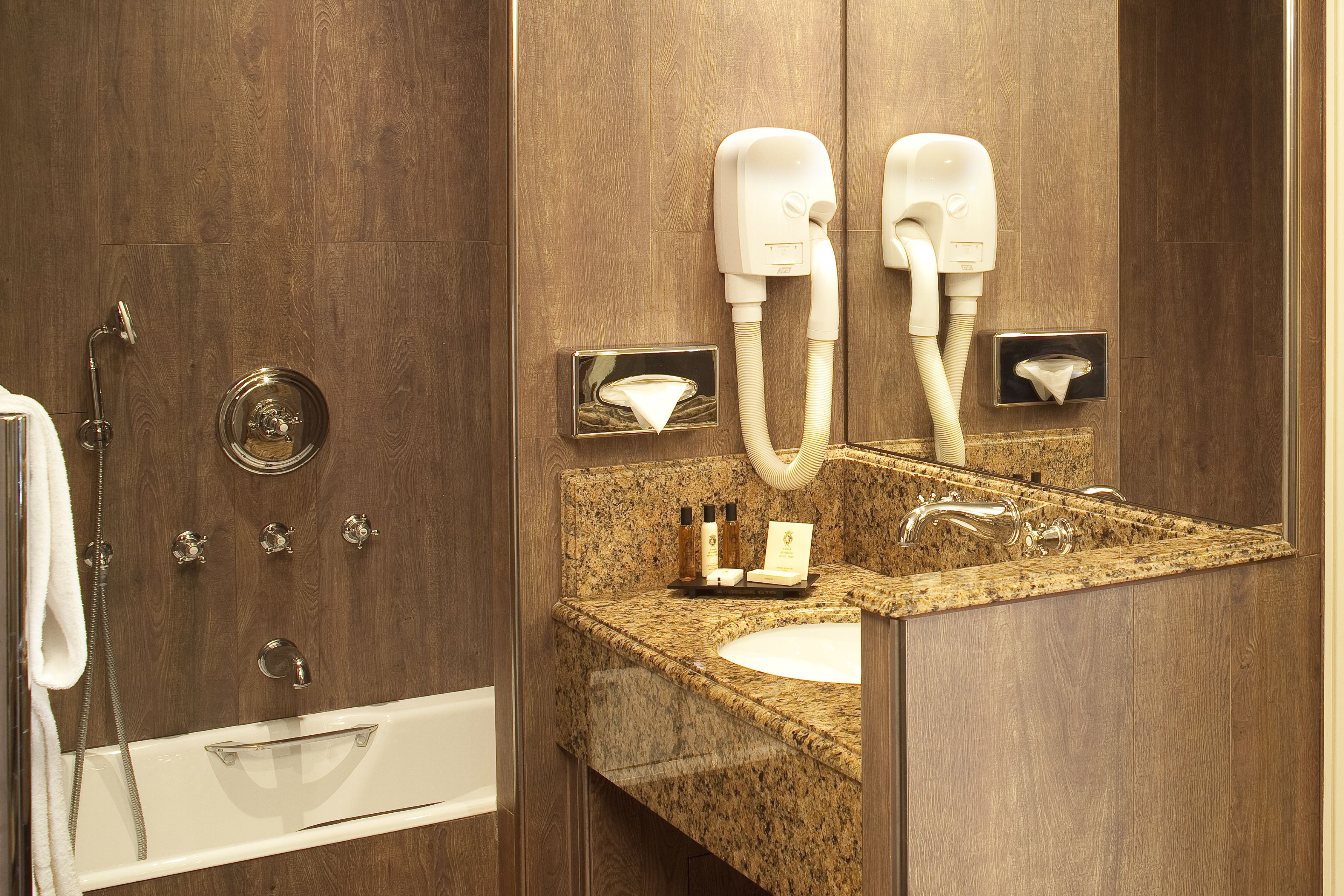 combined shower/bathtub, hair dryer, bathrobes, slippers