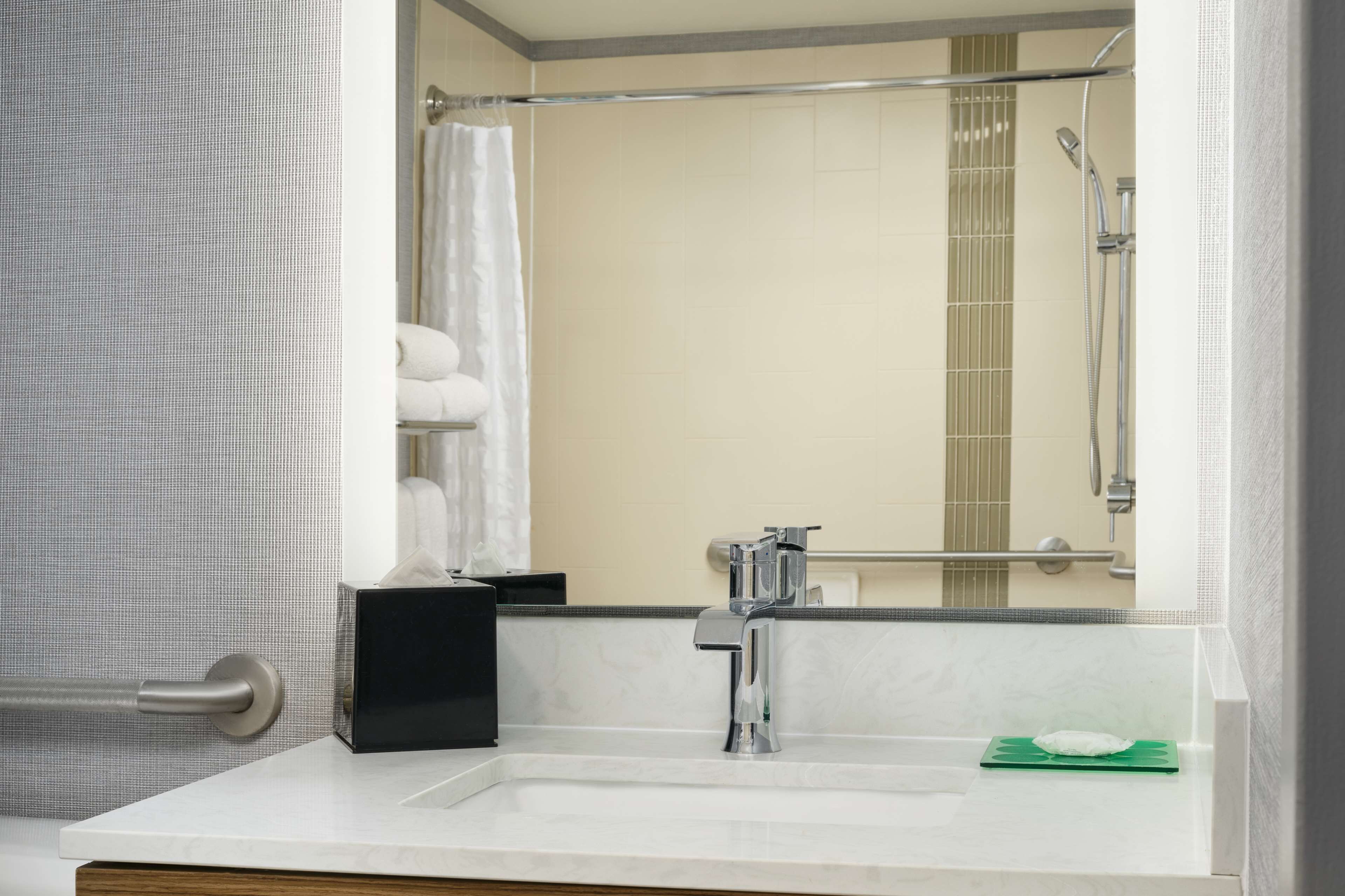 room, 1 king bed, accessible (with shower) | bathroom | combined shower/bathtub, designer toiletries, hair dryer, towels