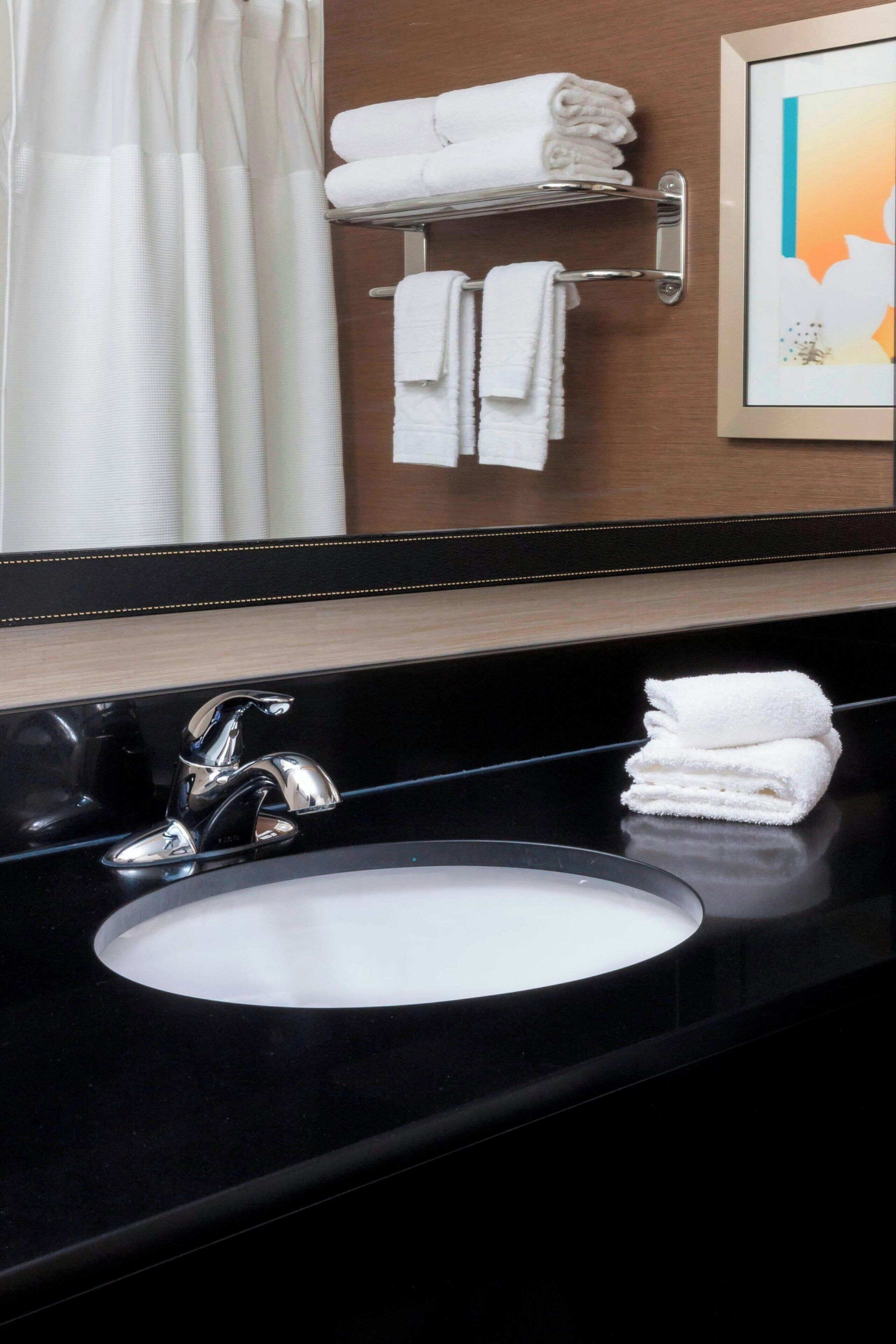 combined shower/bathtub, free toiletries, hair dryer, towels