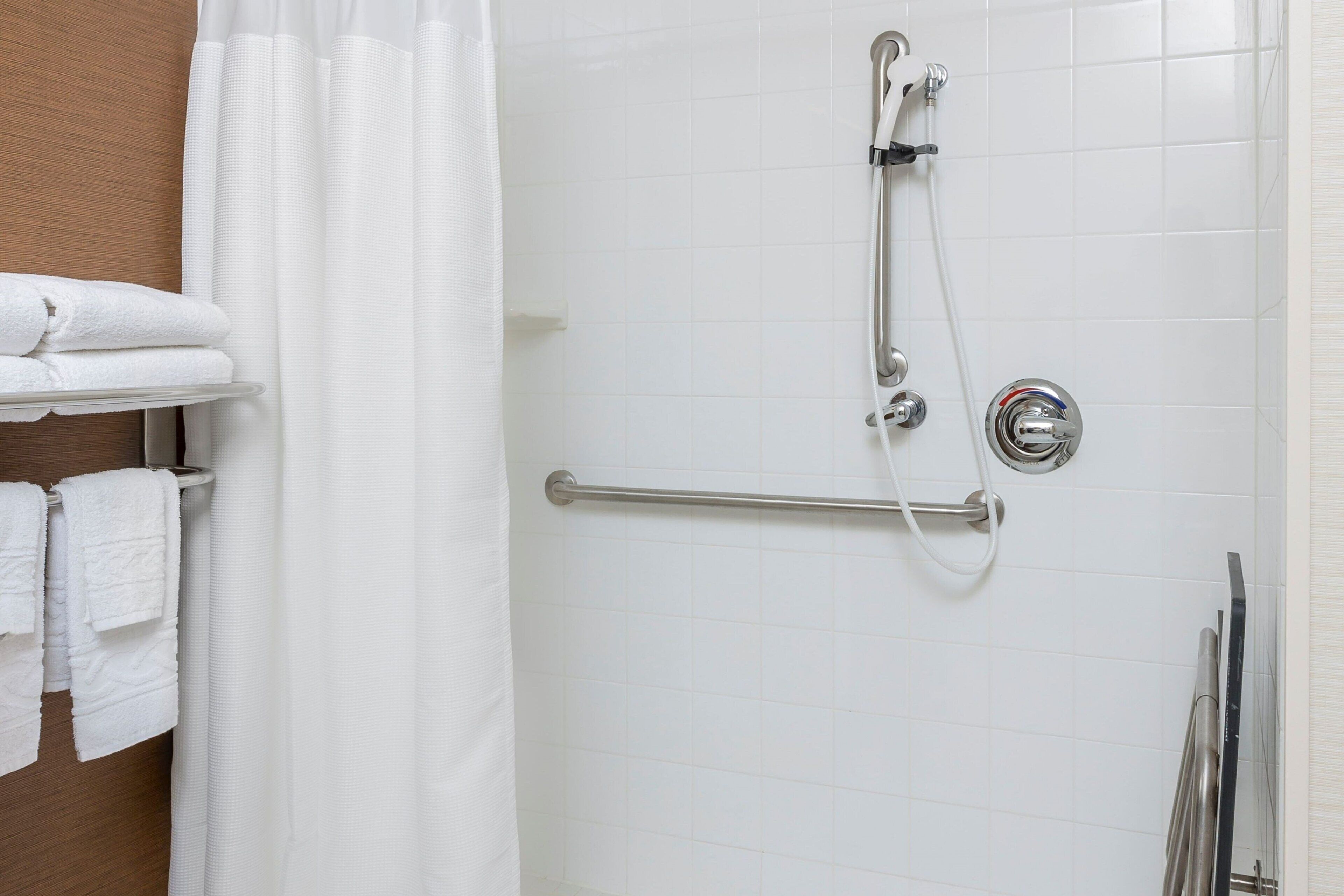 combined shower/bathtub, free toiletries, hair dryer, towels
