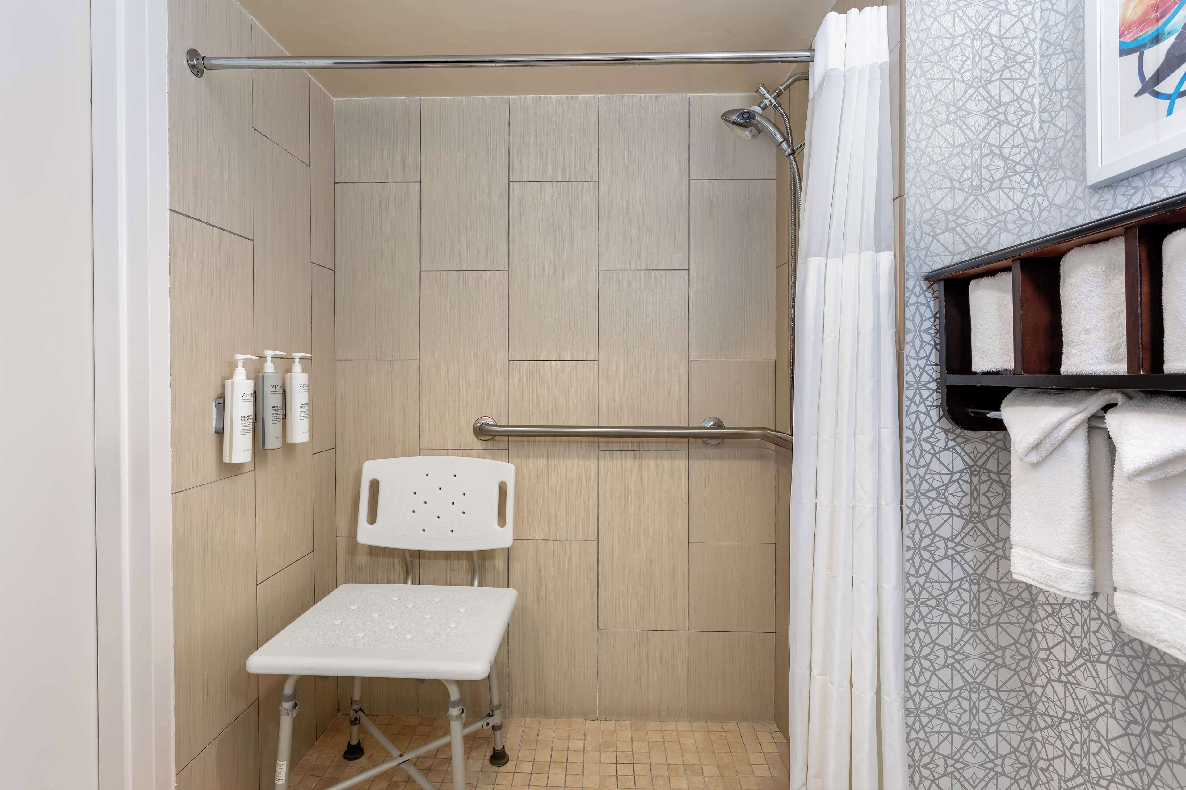 1 king bed, mobility access, roll in shower, non smoking | bathroom shower