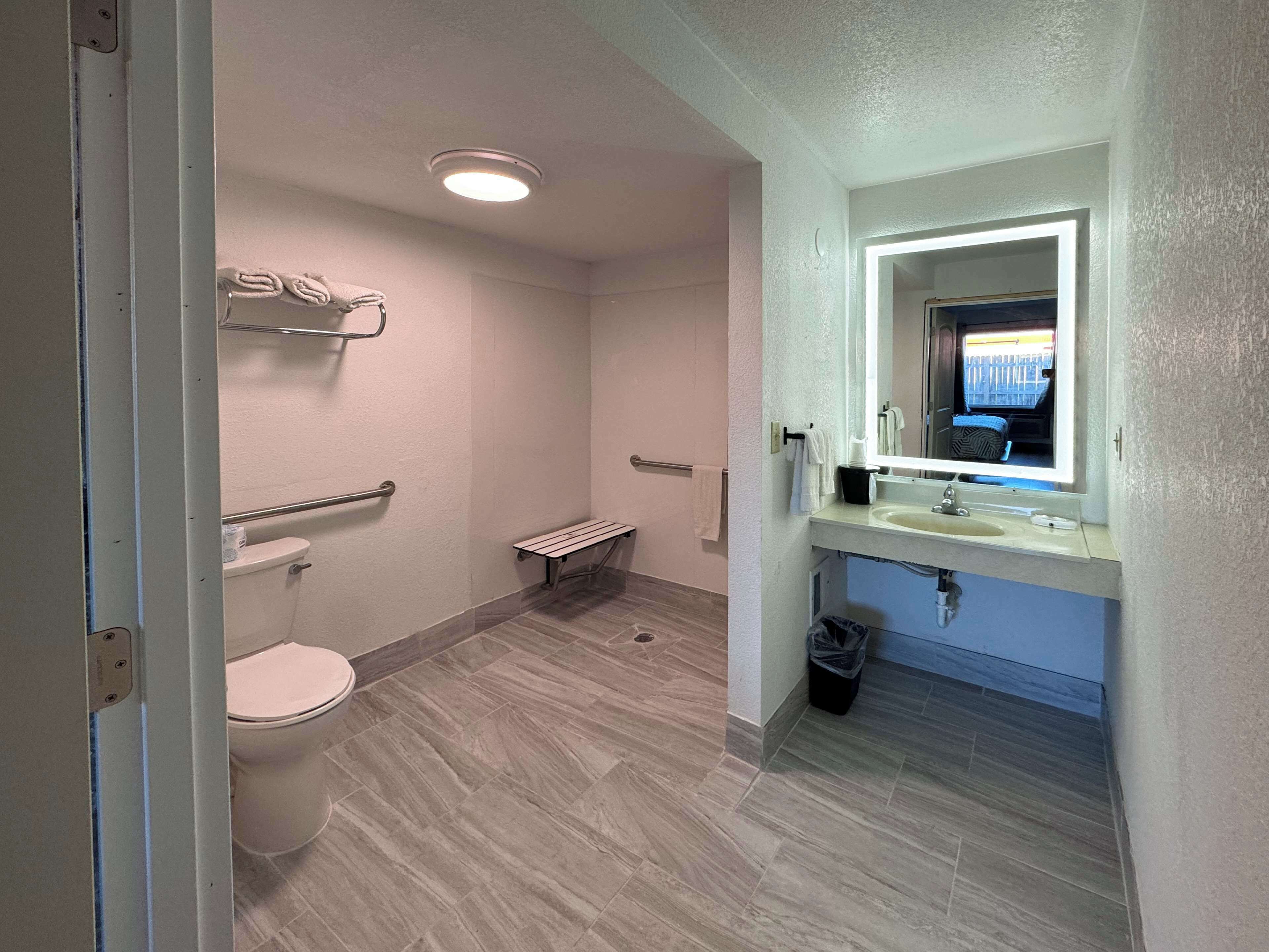 Shower, hair dryer (on request), towels, shampoo
