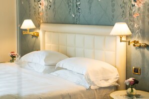 Premium bedding, down duvets, minibar, in-room safe