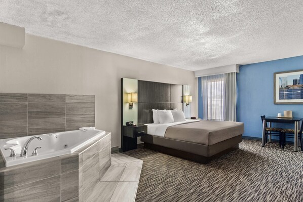 In-room safe, desk, laptop workspace, blackout curtains - Quality Inn Jacksonville - Orange Park near Naval Air Station (Jacksonville)