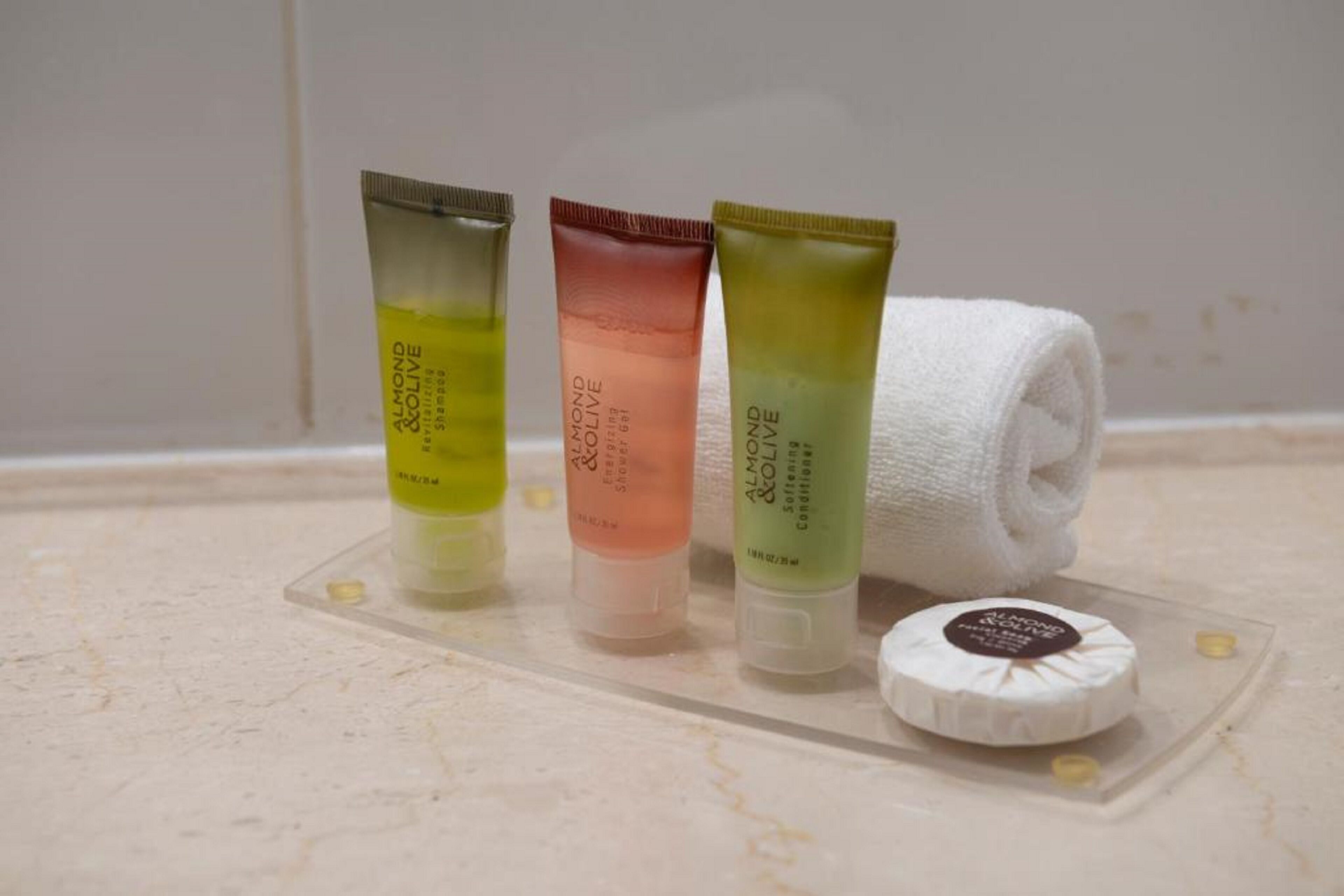 combined shower/bathtub, rainfall showerhead, designer toiletries