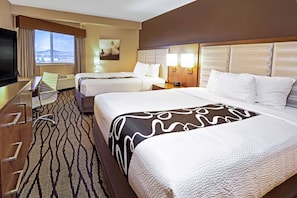 Premium bedding, pillowtop beds, desk, laptop workspace