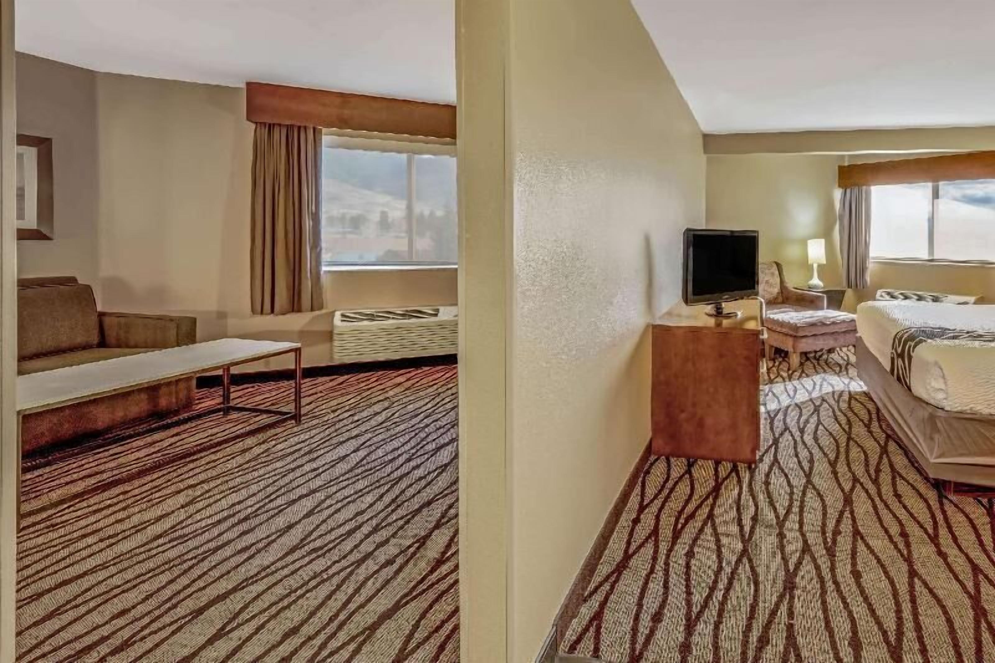 Premium bedding, pillowtop beds, desk, laptop workspace