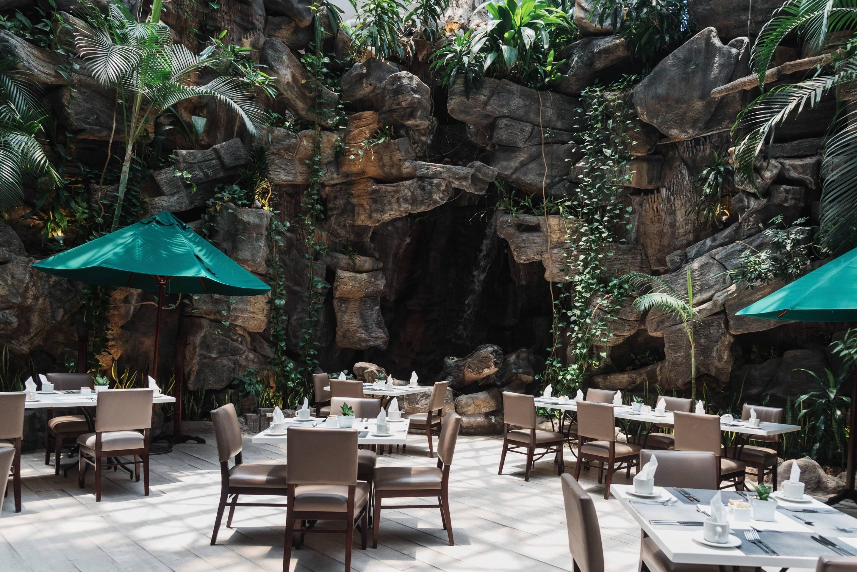 Breakfast, lunch, dinner served; international cuisine, garden views 