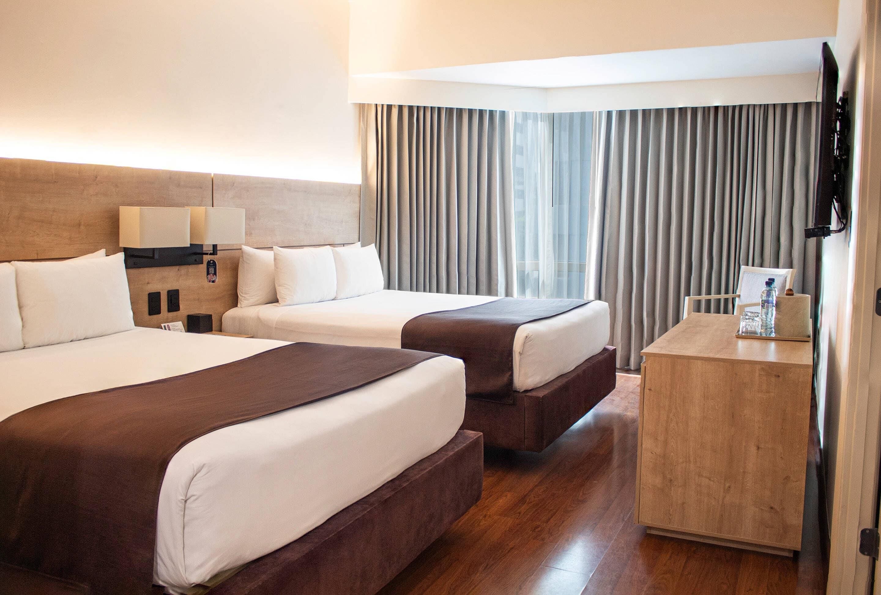 Room, Multiple Beds, Non Smoking (Upgrade) | 1 bedroom, pillowtop beds, in-room safe, desk