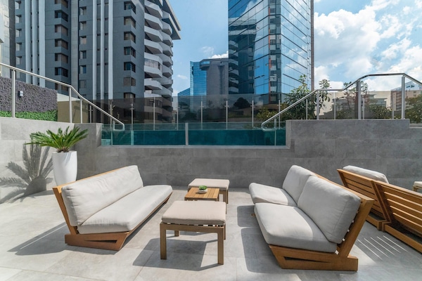 Outdoor pool, open 10:00 AM to 6:00 PM, pool umbrellas, sun loungers