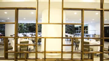 Breakfast, lunch, dinner served; international cuisine, garden views