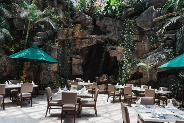 Breakfast, lunch, dinner served; international cuisine, garden views