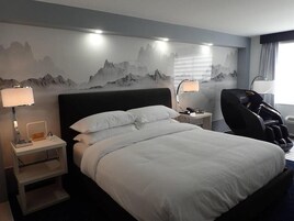 Desk, laptop workspace, blackout drapes, iron/ironing board