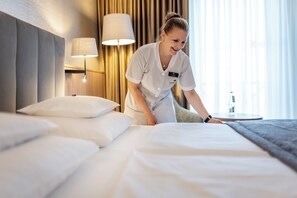 Premium bedding, pillow-top beds, minibar, in-room safe