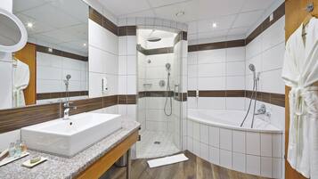 Suite, Garden View (Single Use) | Bathroom | Shower, free toiletries, hair dryer, slippers