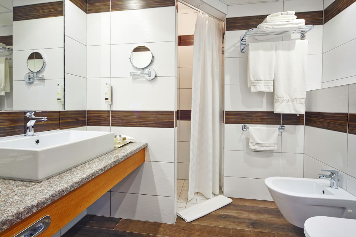 shower, free toiletries, hair dryer, slippers