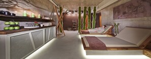 Relax in this serene space with a central walkway leading to a seating area and a single bed.
