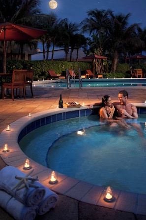 Outdoor pool, open 7 AM to 11 PM, pool umbrellas, pool loungers