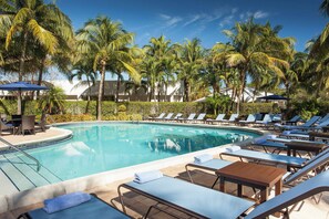 Outdoor pool, open 7 AM to 11 PM, pool umbrellas, pool loungers