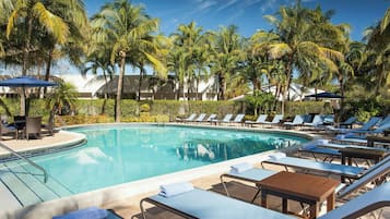 Outdoor pool, open 7 AM to 11 PM, pool umbrellas, pool loungers