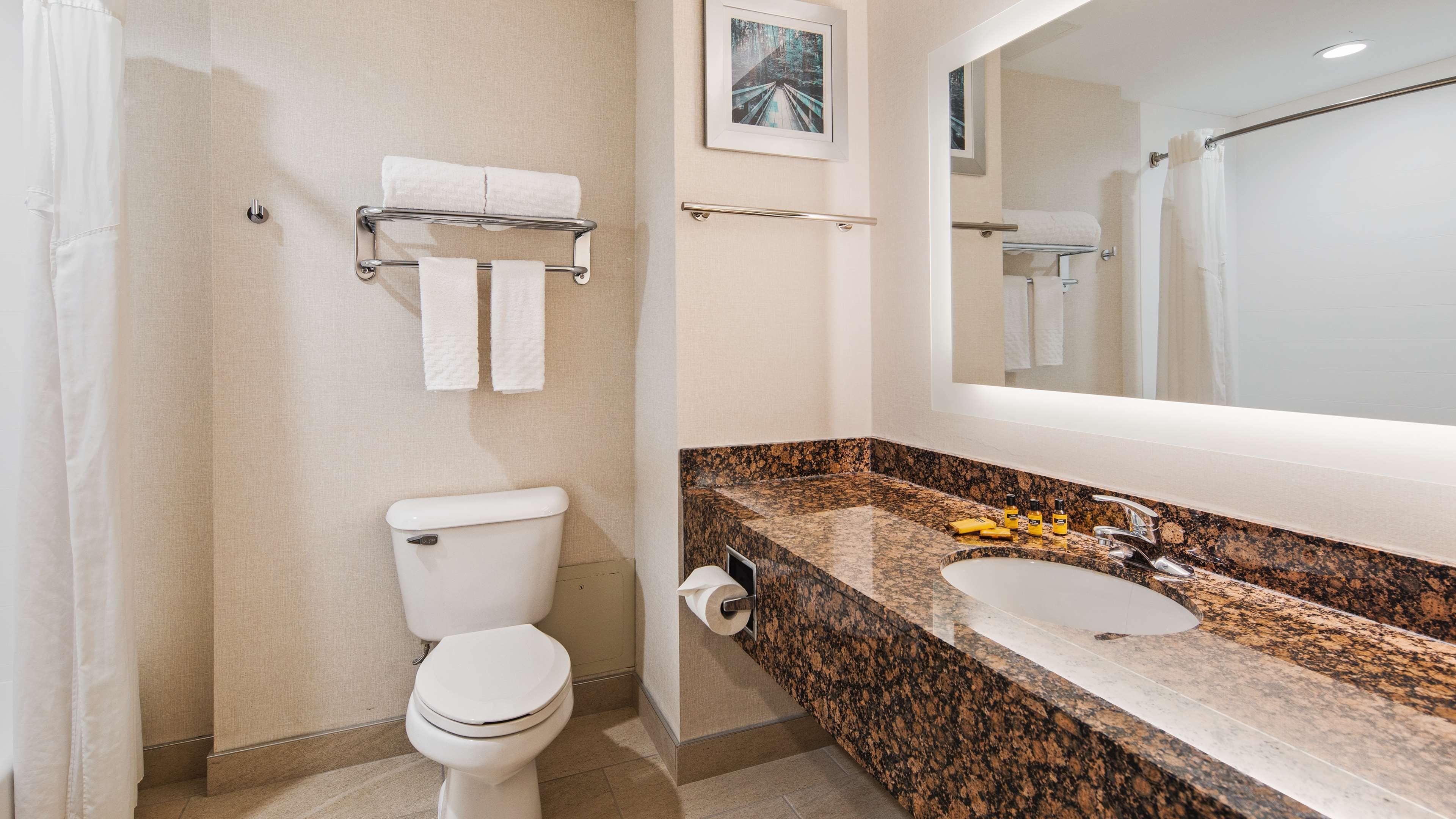 standard room, 2 queen beds, non smoking, refrigerator & microwave | bathroom | free toiletries, hair dryer, towels, soap