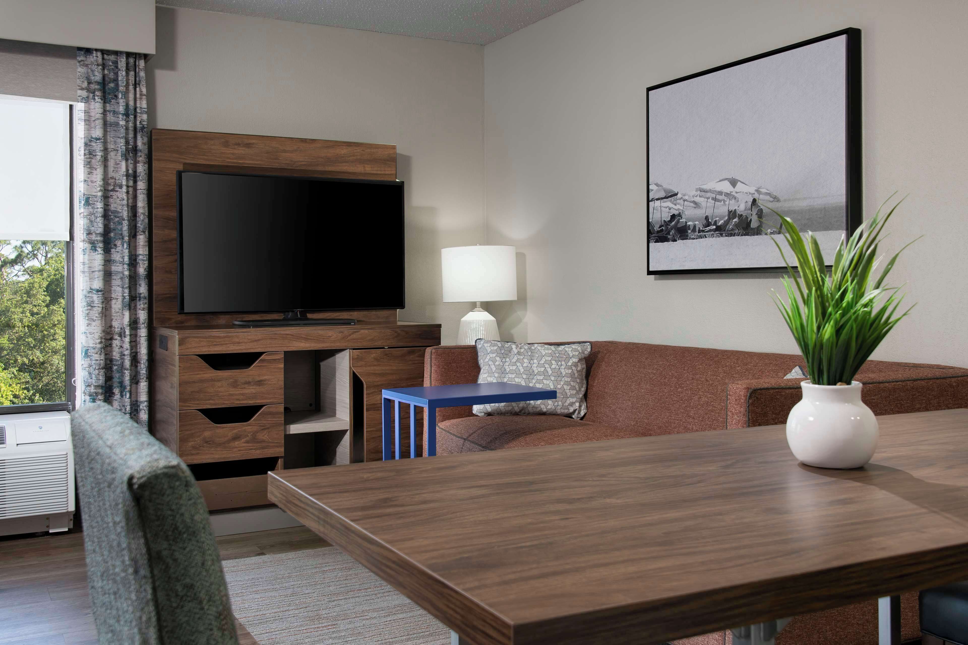 junior suite one king and one sofa bed non-smoking | living area | 40-inch lcd tv with cable channels, tv