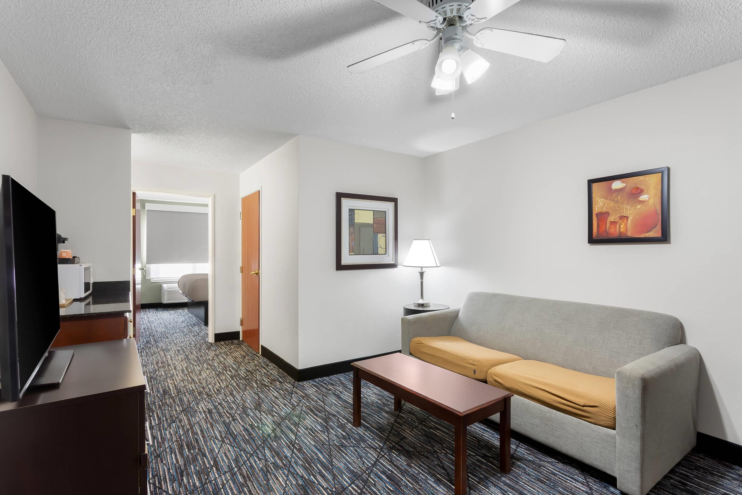 Suite, Non Smoking (1 King Bedroom) | Desk, iron/ironing board, free cribs/infant beds, rollaway beds