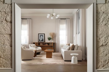 Hotel amenities such as safe, desk and work area at Plaza San Antonio Hotel & Spa, Autograph Collection