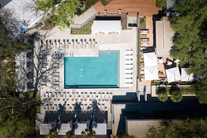 Outdoor pool, open 9:00 AM to 10:00 PM, cabanas (surcharge)