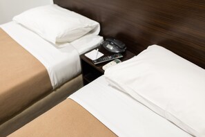 In-room safe, blackout curtains, iron/ironing board, cots/infant beds