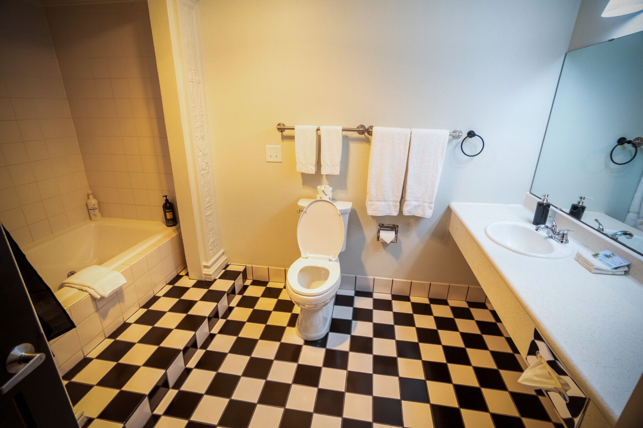 signature studio suite | bathroom | deep-soaking bathtub, free toiletries, hair dryer, towels