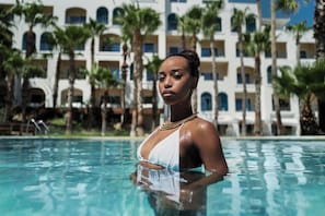 2 outdoor pools, open 8:00 AM to 8:00 PM, cabanas (surcharge)