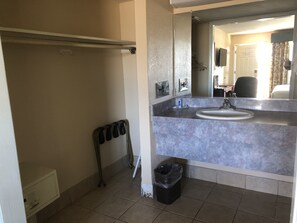 Standard Room, 1 King Bed, Smoking | Bathroom | Hair dryer, towels