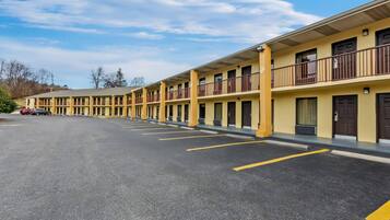 A motel with multiple floors and balconies.