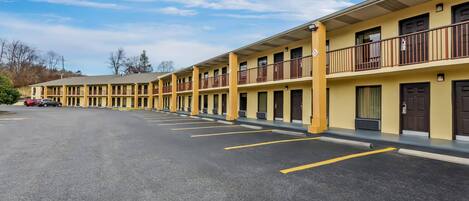 A motel with multiple floors and balconies.