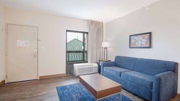 Suite, 1 King-Bett und Schlafsofa, Nichtraucher | Schreibtisch, laptopgeeigneter Arbeitsplatz, Verdunkelungsvorhänge