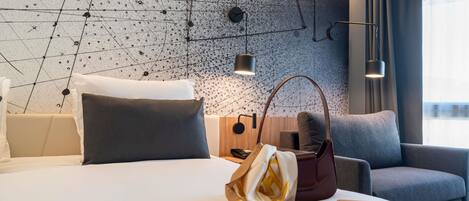 Premium bedding, desk, blackout drapes, soundproofing